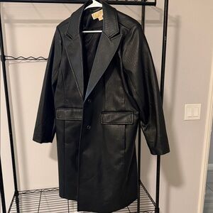 Michael Kohrs black faux leather trench coat